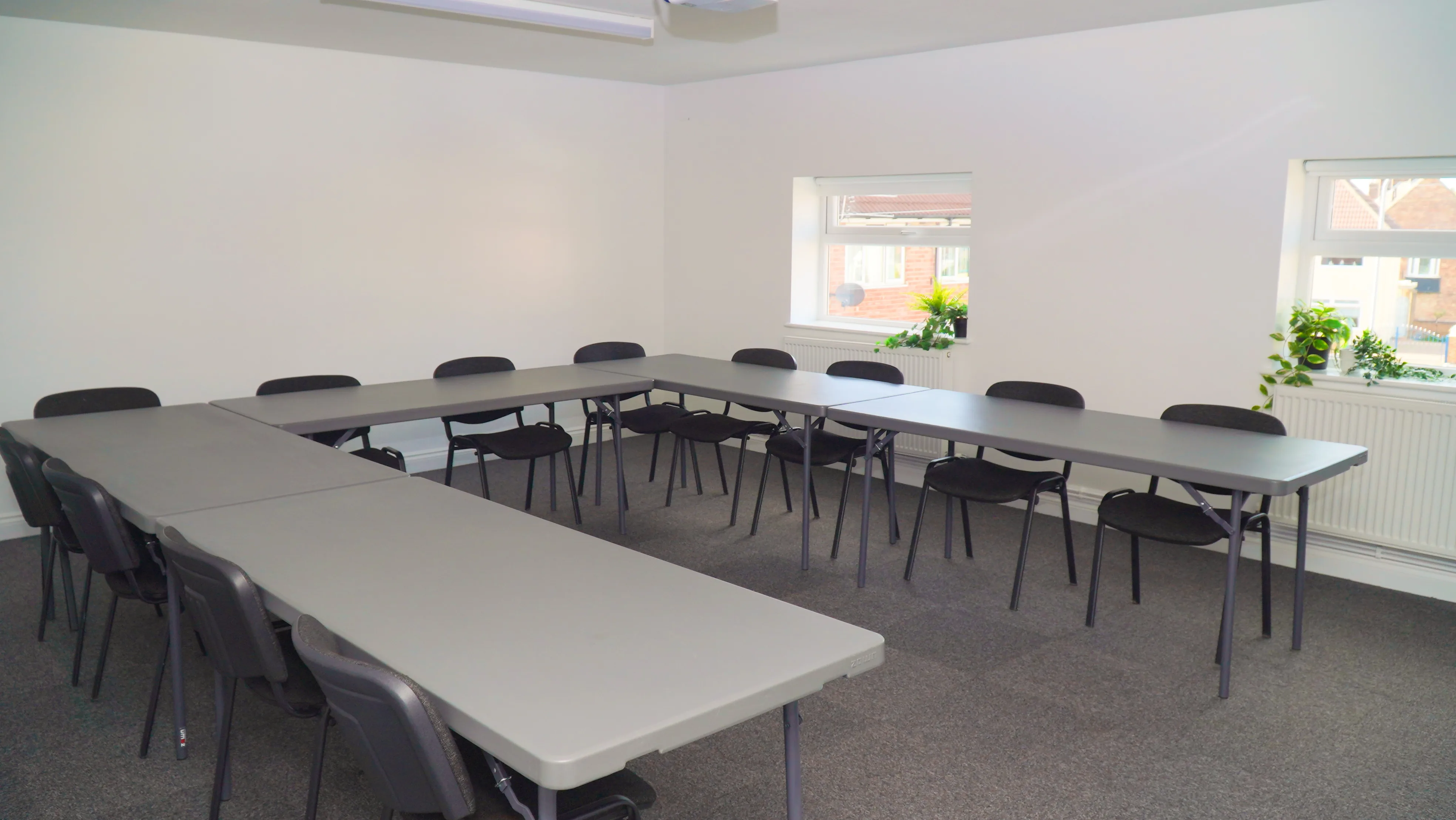 The Hub meeting room at the Maggie O'Neill Centre set as a boardroom