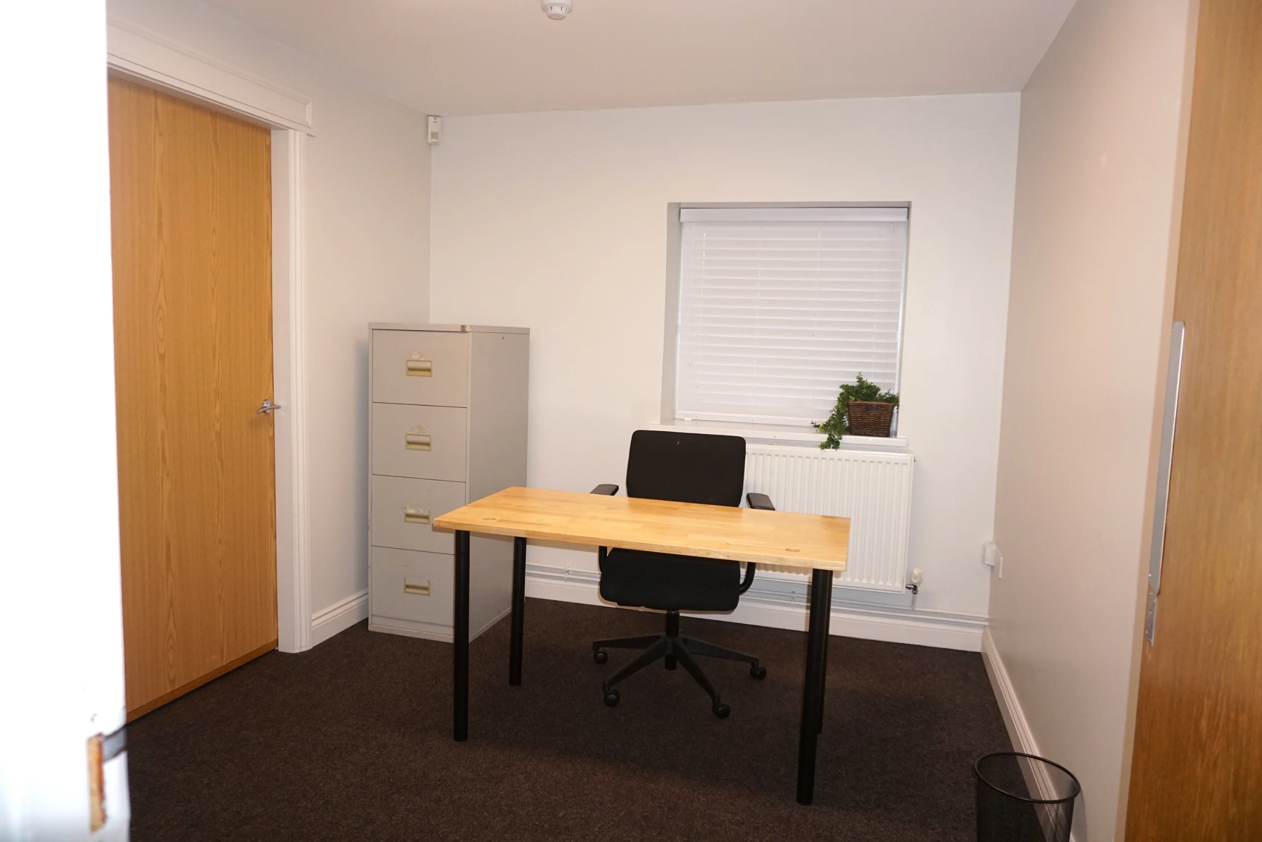 Office 202, a private office at the Maggie O'Neill Centre, with a desk by the window