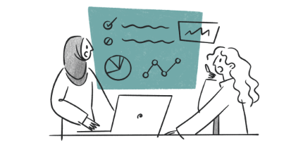 2 people looking at data together