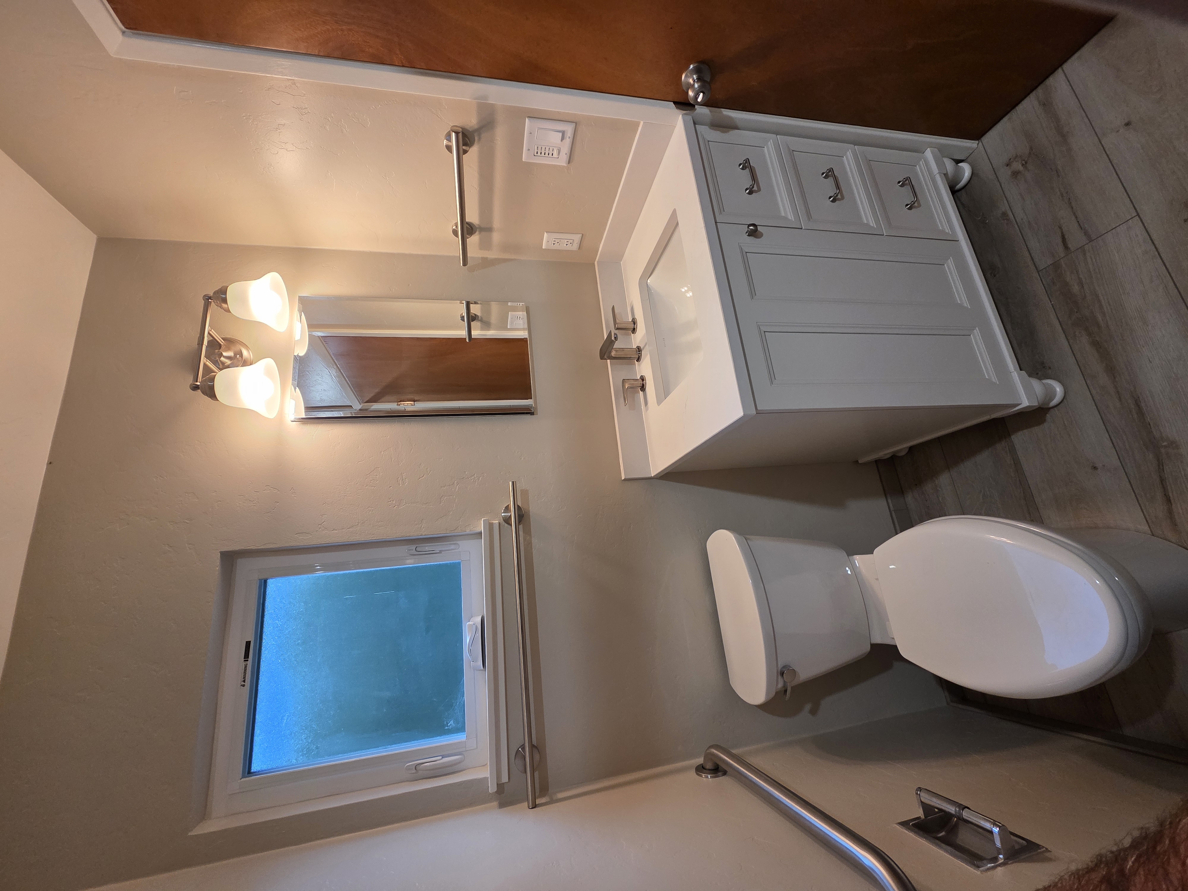 Custom bathroom vanity and remodeled bathroom completed by Steve Haage of SMH Remodeling
