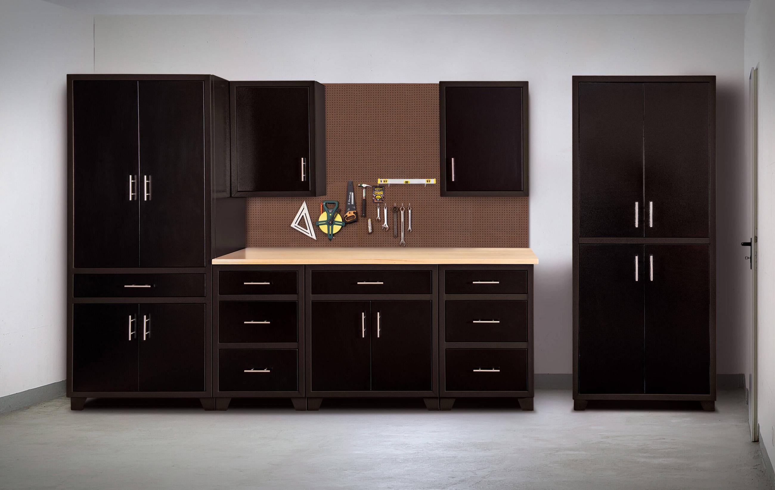 Black aluminum garage cabinet wall with tall cabinets, drawer bases, wall cabinets and a pegboard