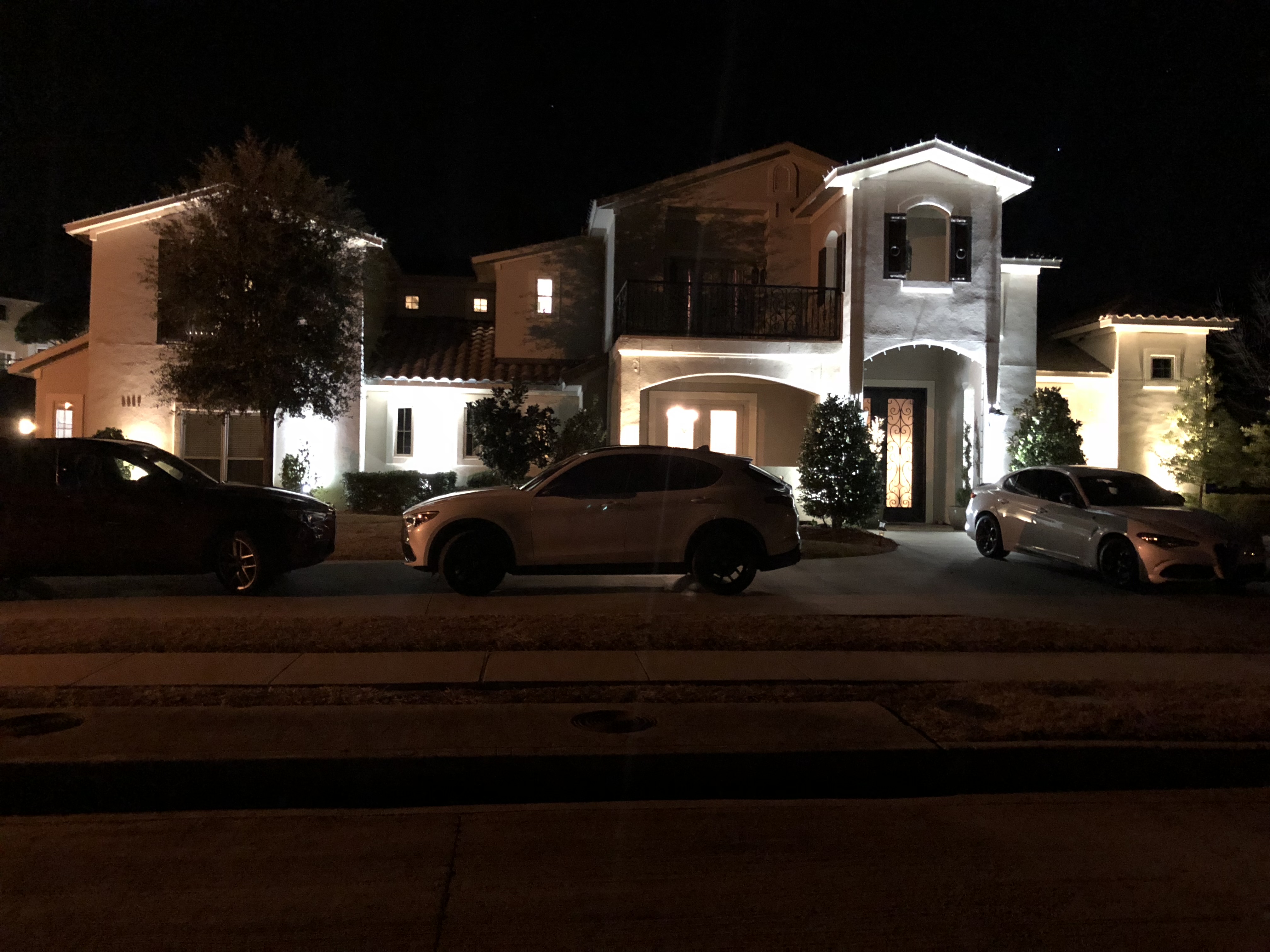 Custom exterior and landscape lighting installation by Rockwall Remodeling in Rockwall, TX