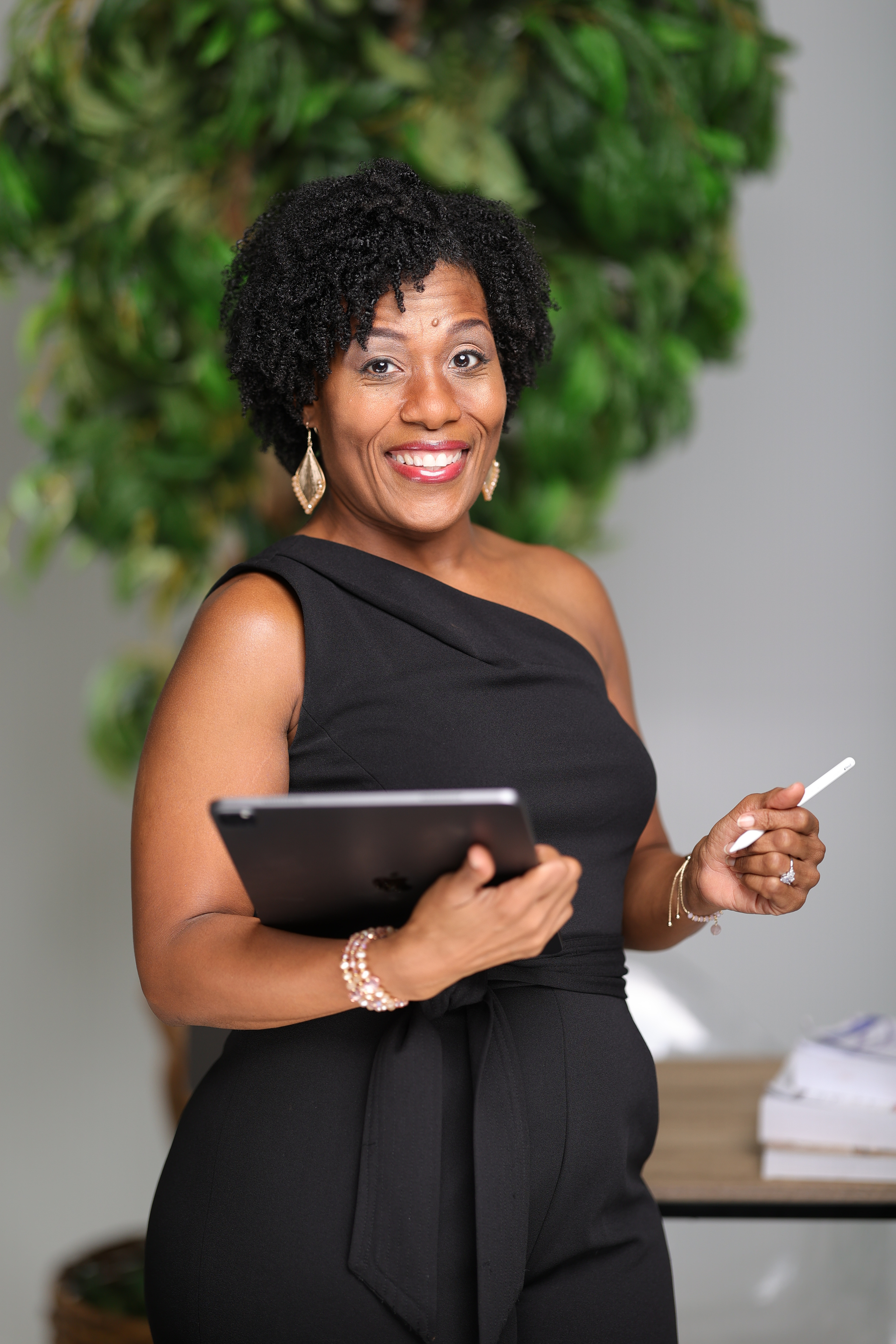 T'knesha James holding a tablet