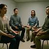 A group of people seated in quiet meditation in a clinical setting, representing the MORE study and the unexpected door it opened A group of people seated in quiet meditation in a clinical setting, representing the MORE study and the unexpected door it opened