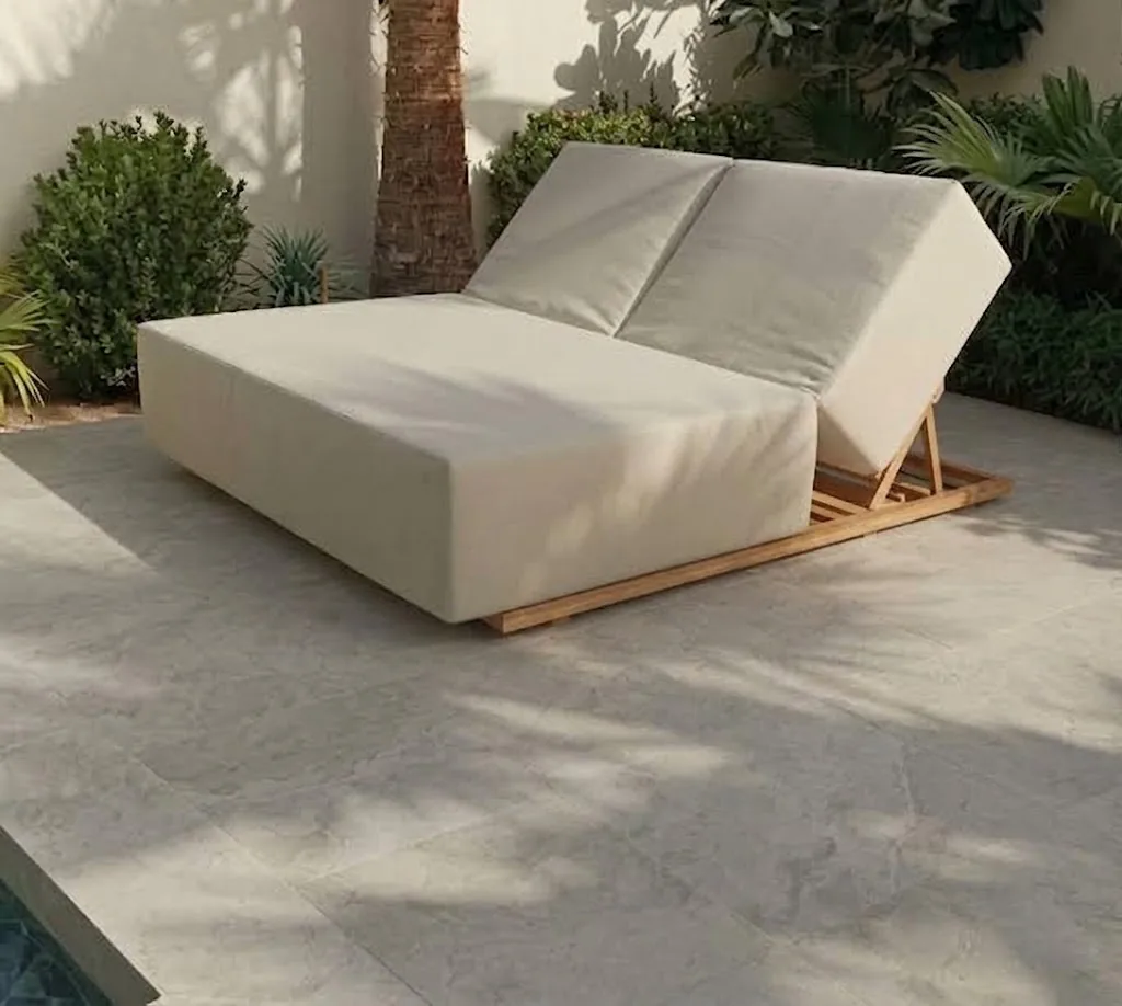 Cream outdoor daybed with an adjustable back