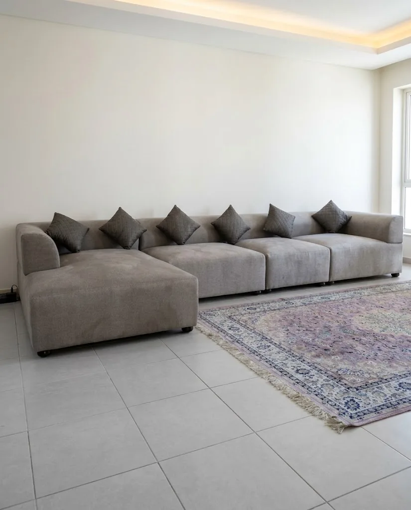 Grey modular sofa with scatter cushions