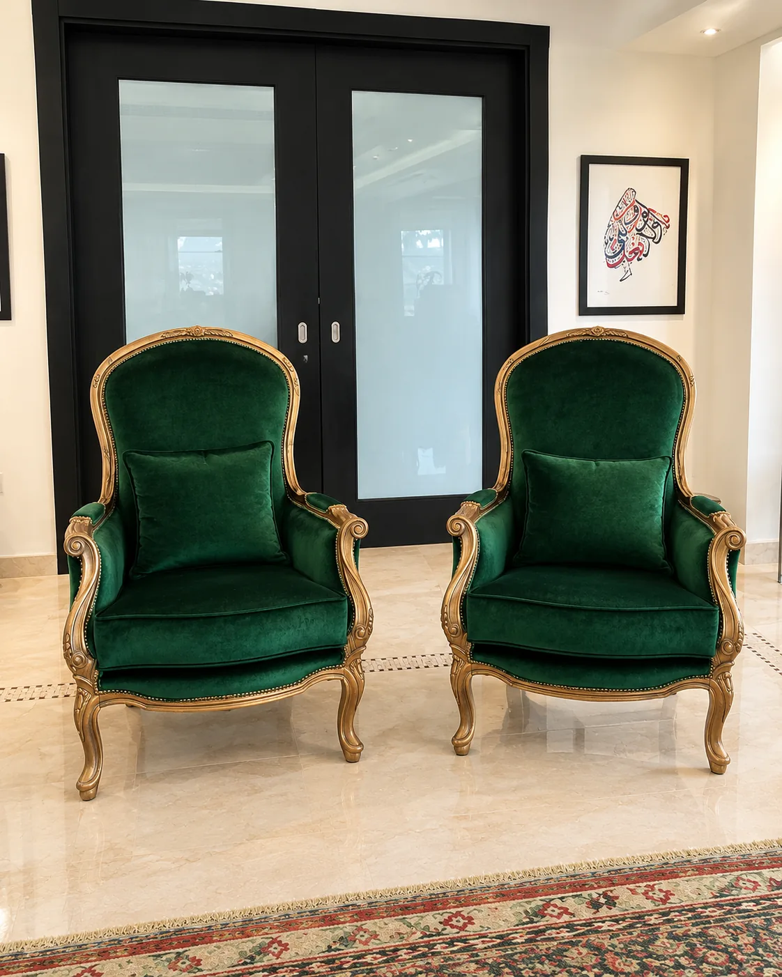 Pair of gilded armchairs upholstered in green velvet
