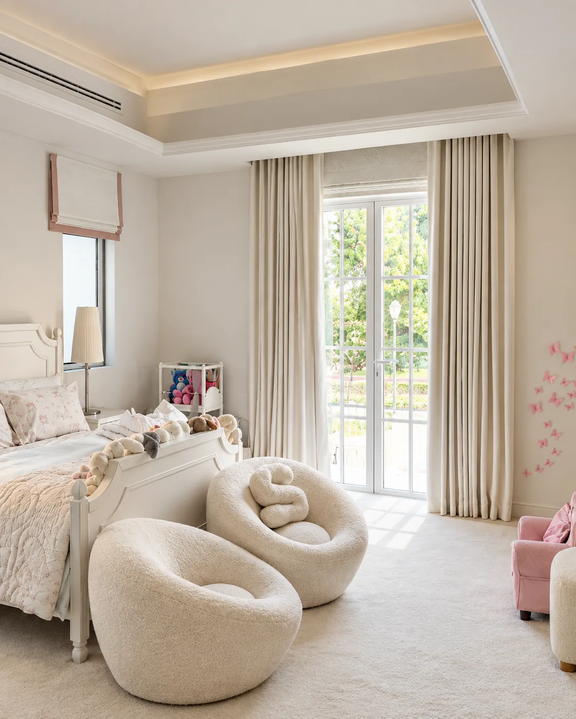Taupe wave curtains in a girl's bedroom with a garden door