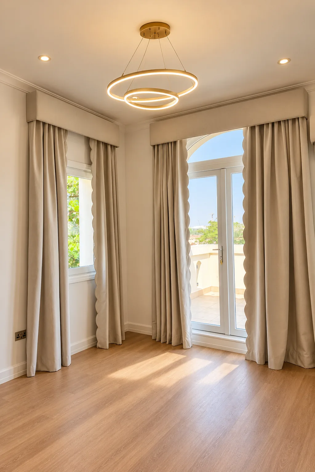 Beige pleated curtains with pelmets framing a window and French door