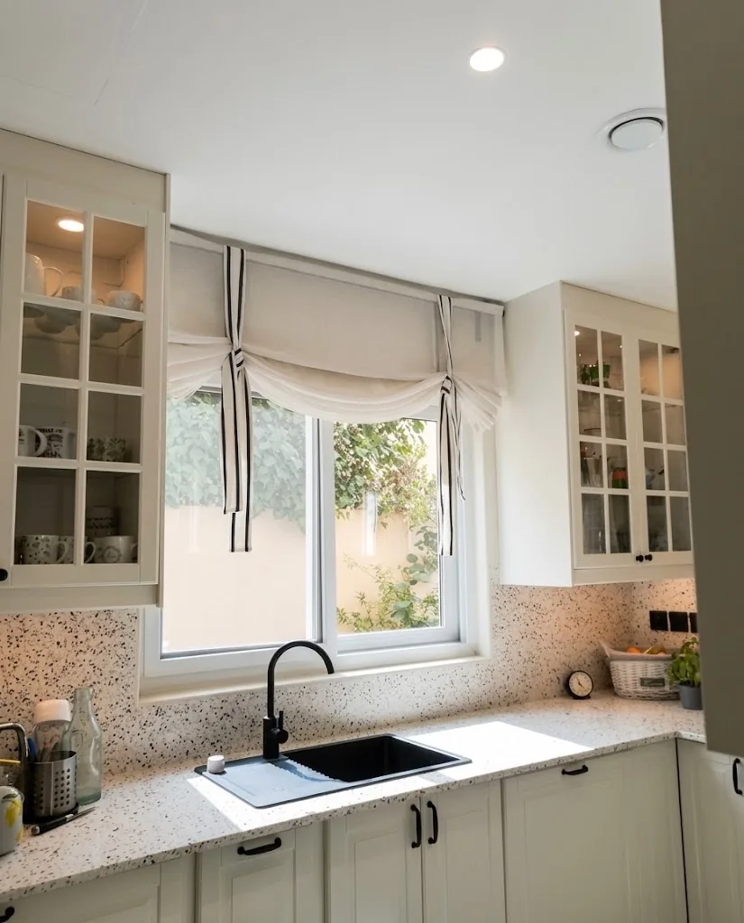 Tie-up Roman blind on a kitchen window