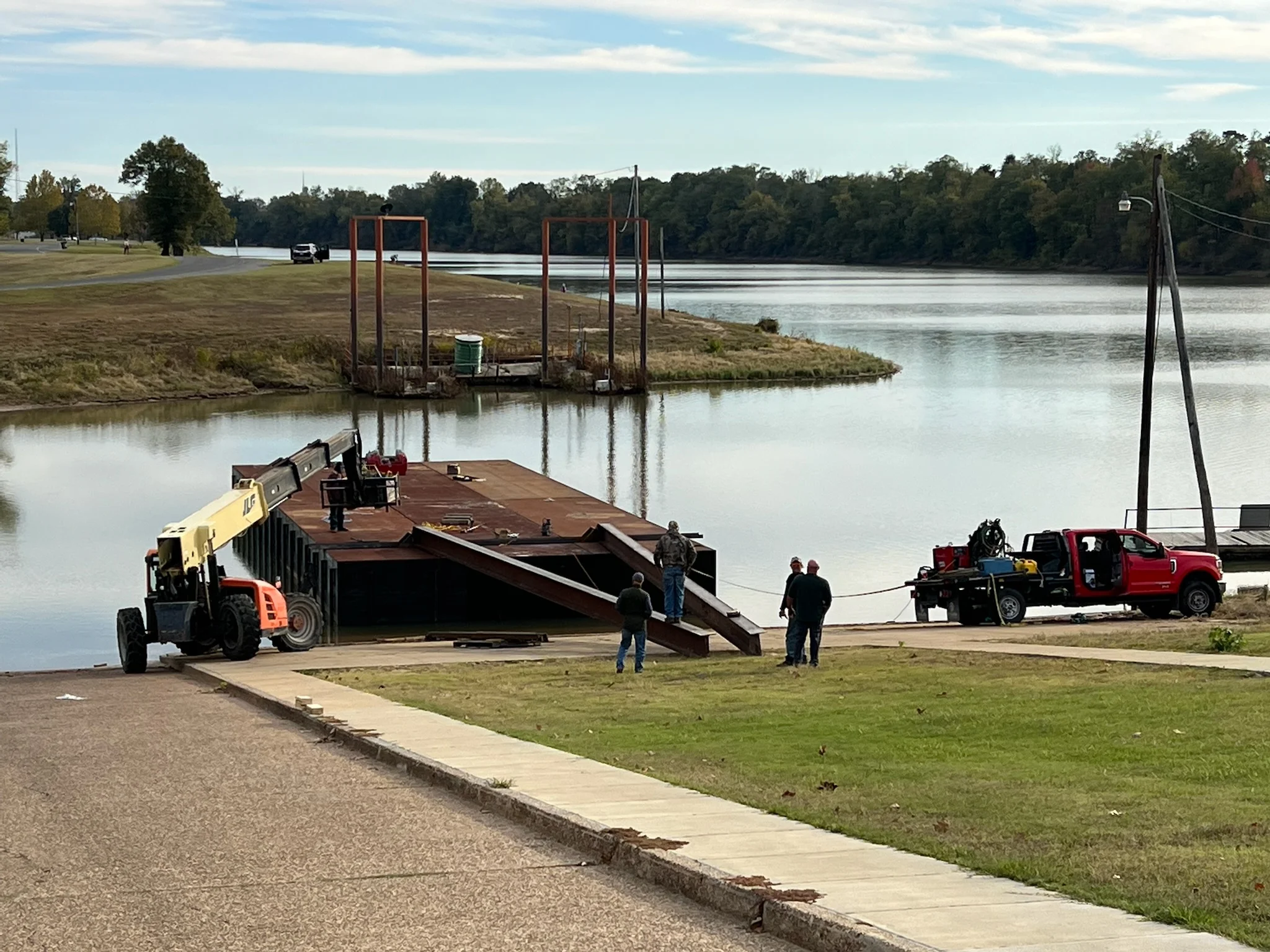 Putting Fitzco contracting barge in the water in Shell Knob, MO