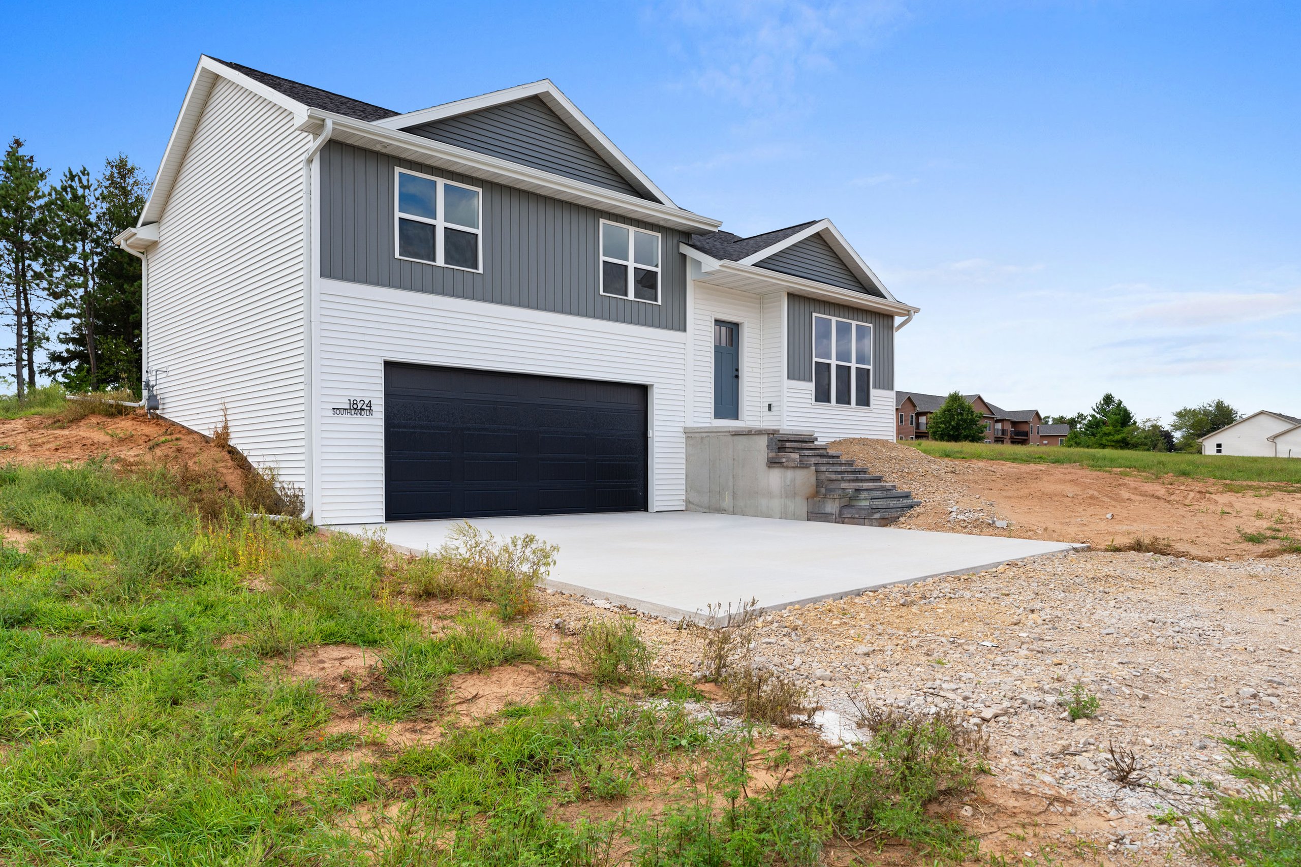 Drive approach view of a finished Celestial Hills home