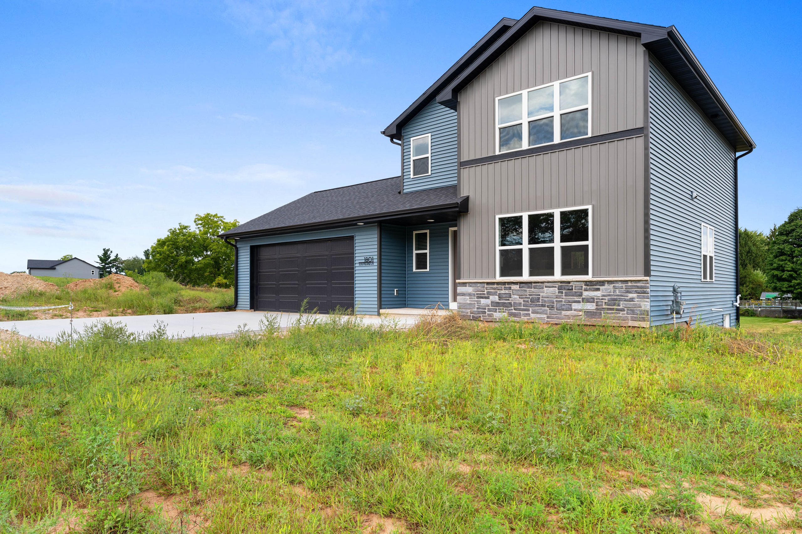Front lawn view of a finished Celestial Hills home