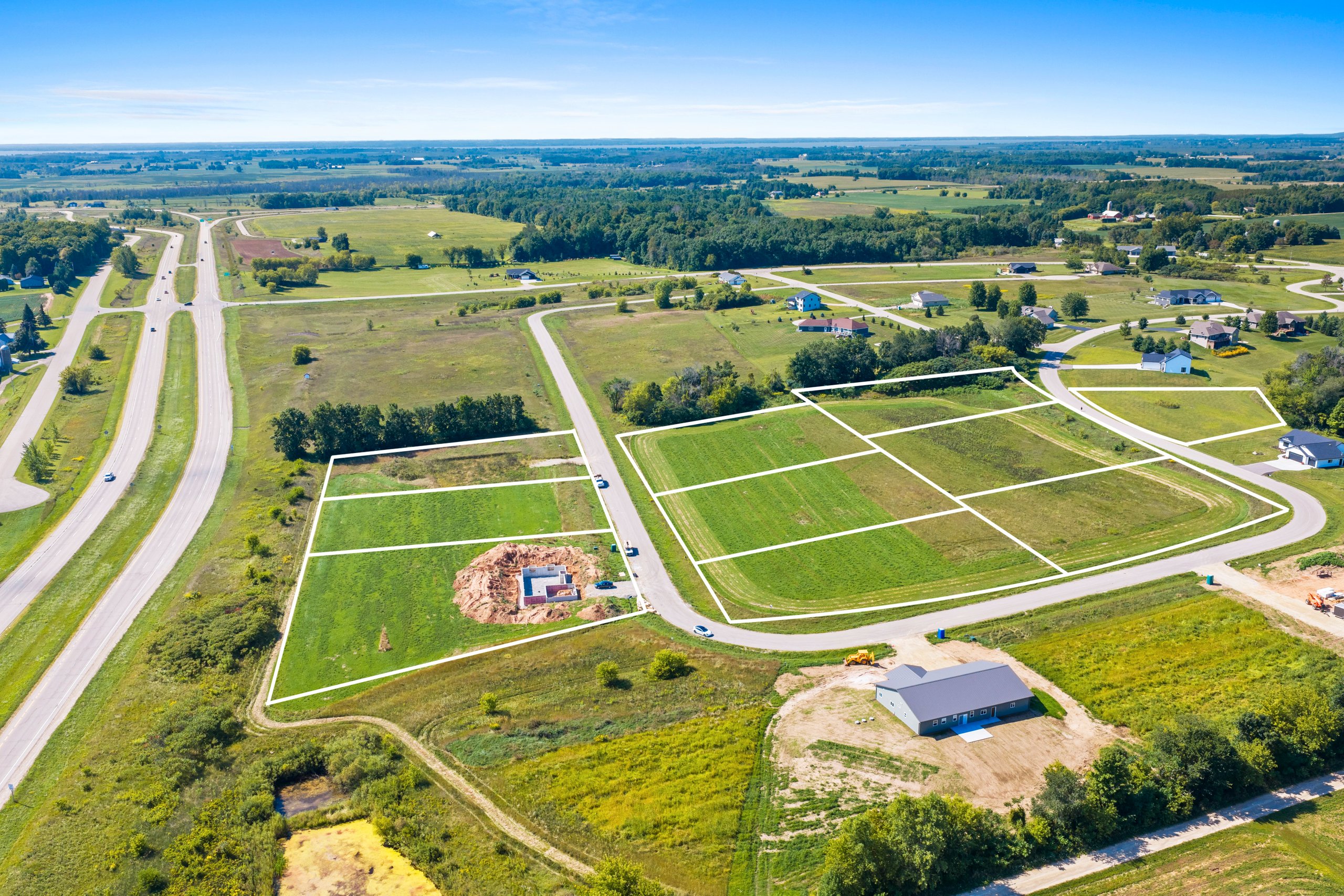 Full aerial overview of the Woodland Hills development