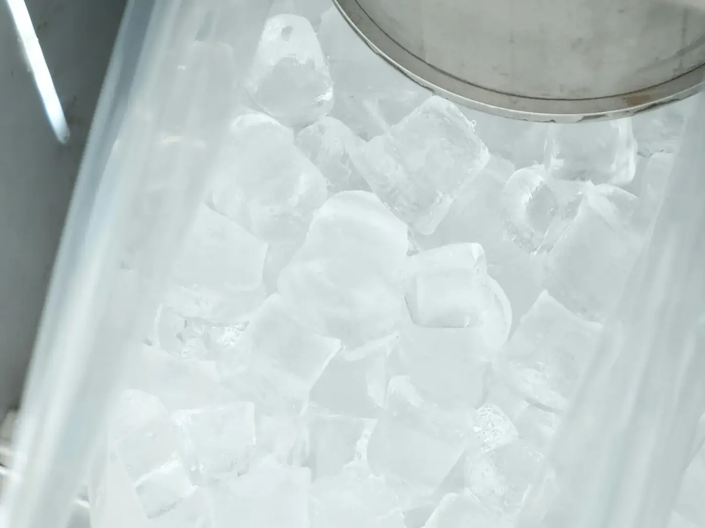 Ice cubes dispensing from a commercial ice machine