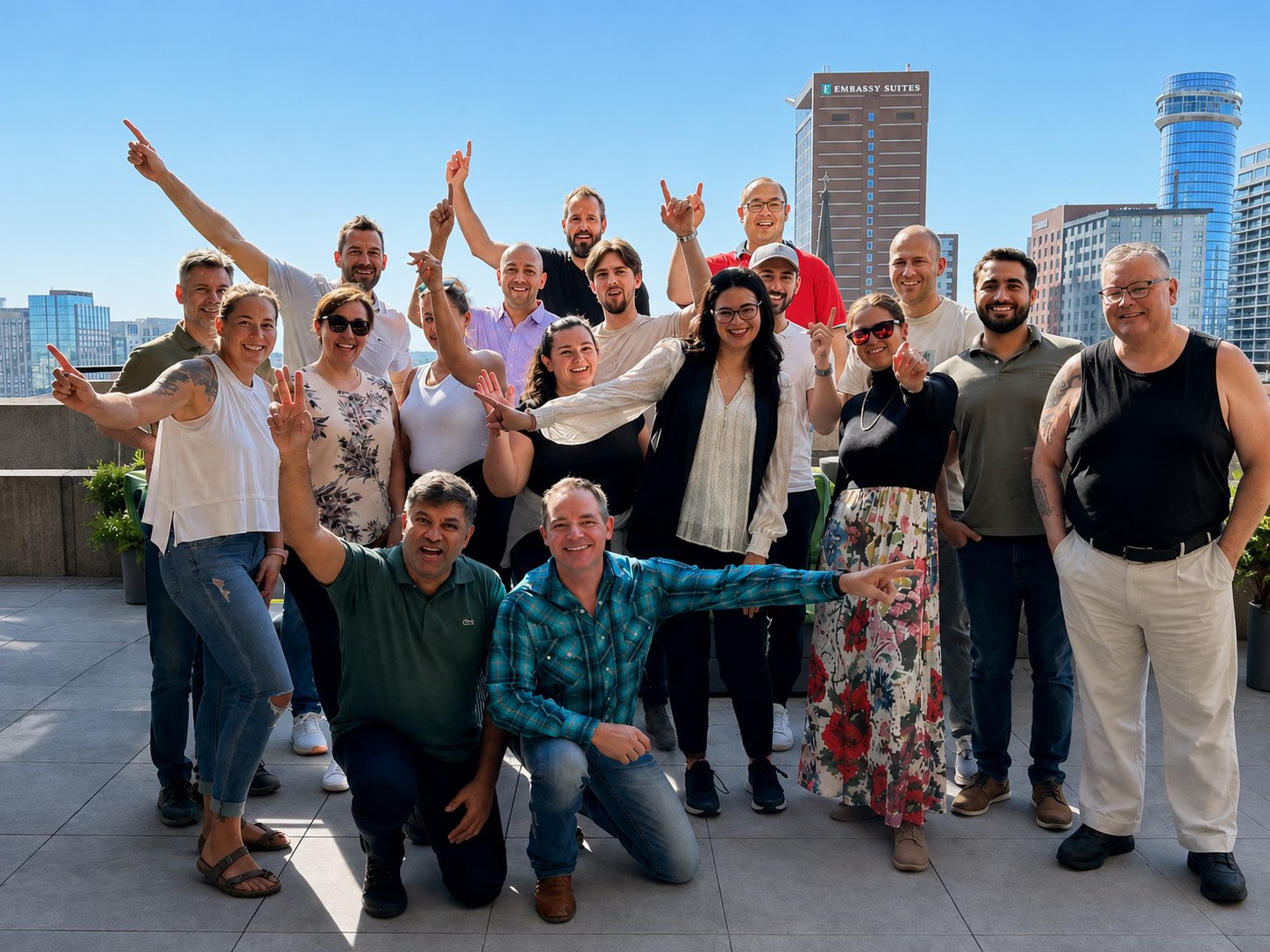 A group celebrating together on a Nashville rooftop