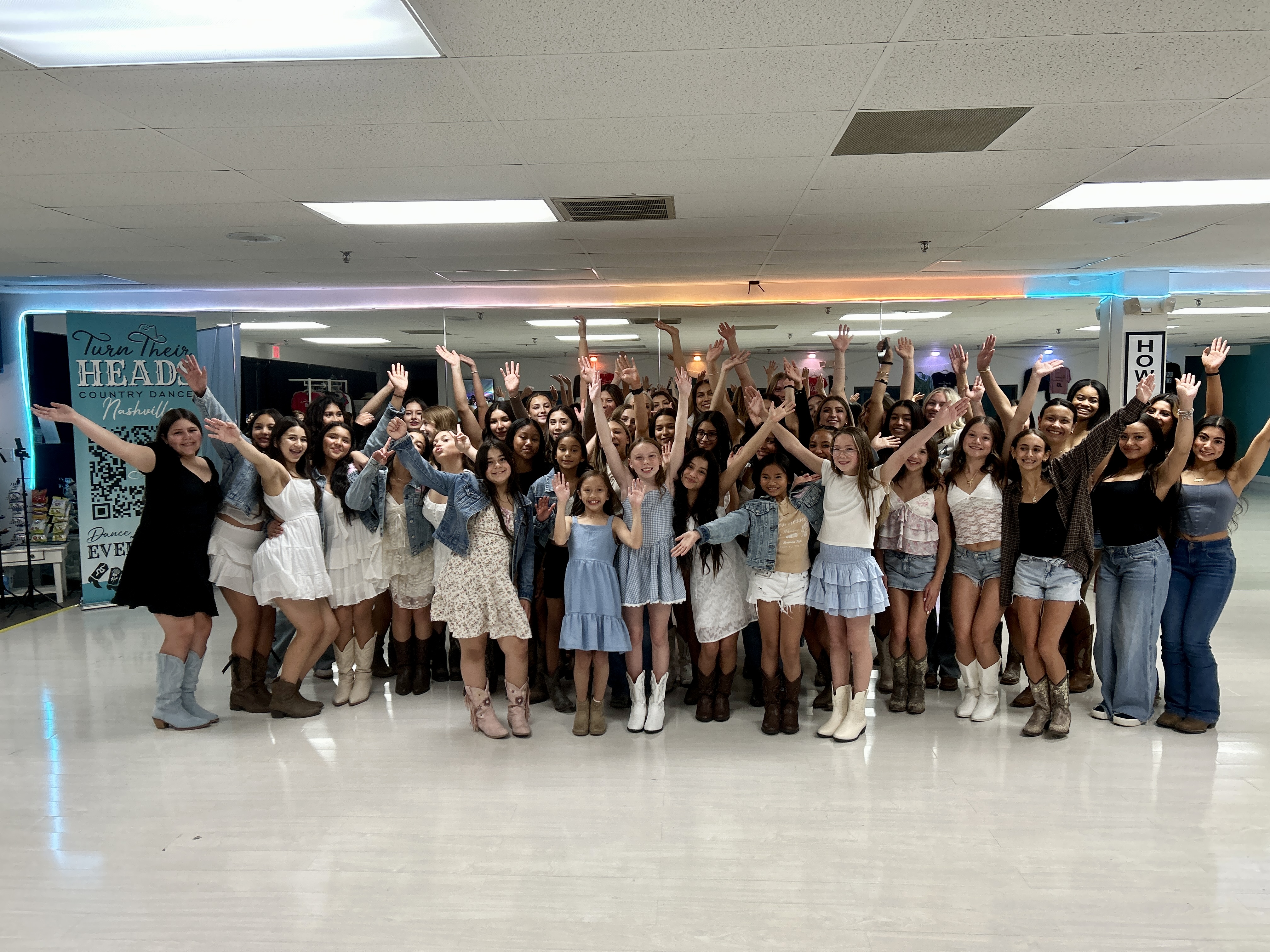 Students celebrating together in the Nashville dance studio.