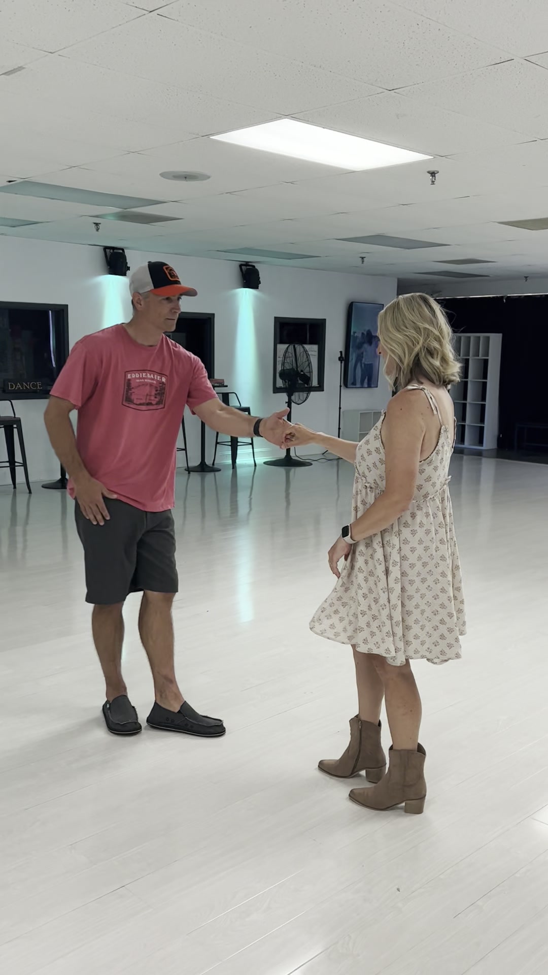 A couple enjoying a private Country Swing lesson