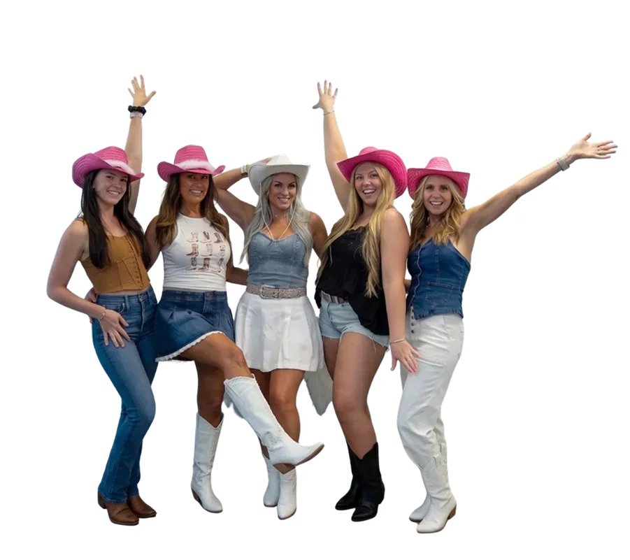 Nash Bach Bash group celebrating together in pink cowboy hats