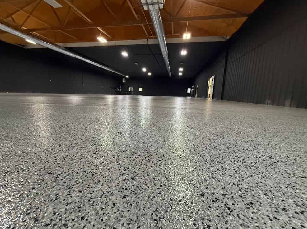 Residential garage flake floor resisting oil and chemical stains