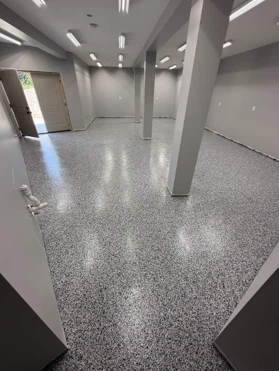 Polished flake floor finished with a clear protective topcoat