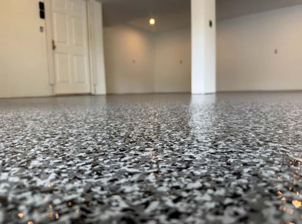 Decorative concrete staining on a patio with warm amber tones