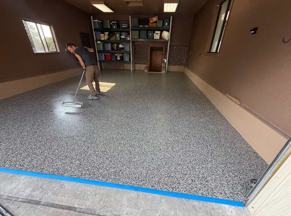 Sealed concrete driveway with a glossy protective wet-look sealer