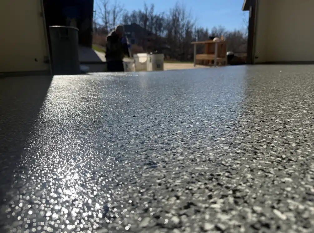 Metallic epoxy statement floor with deep, flowing pigments