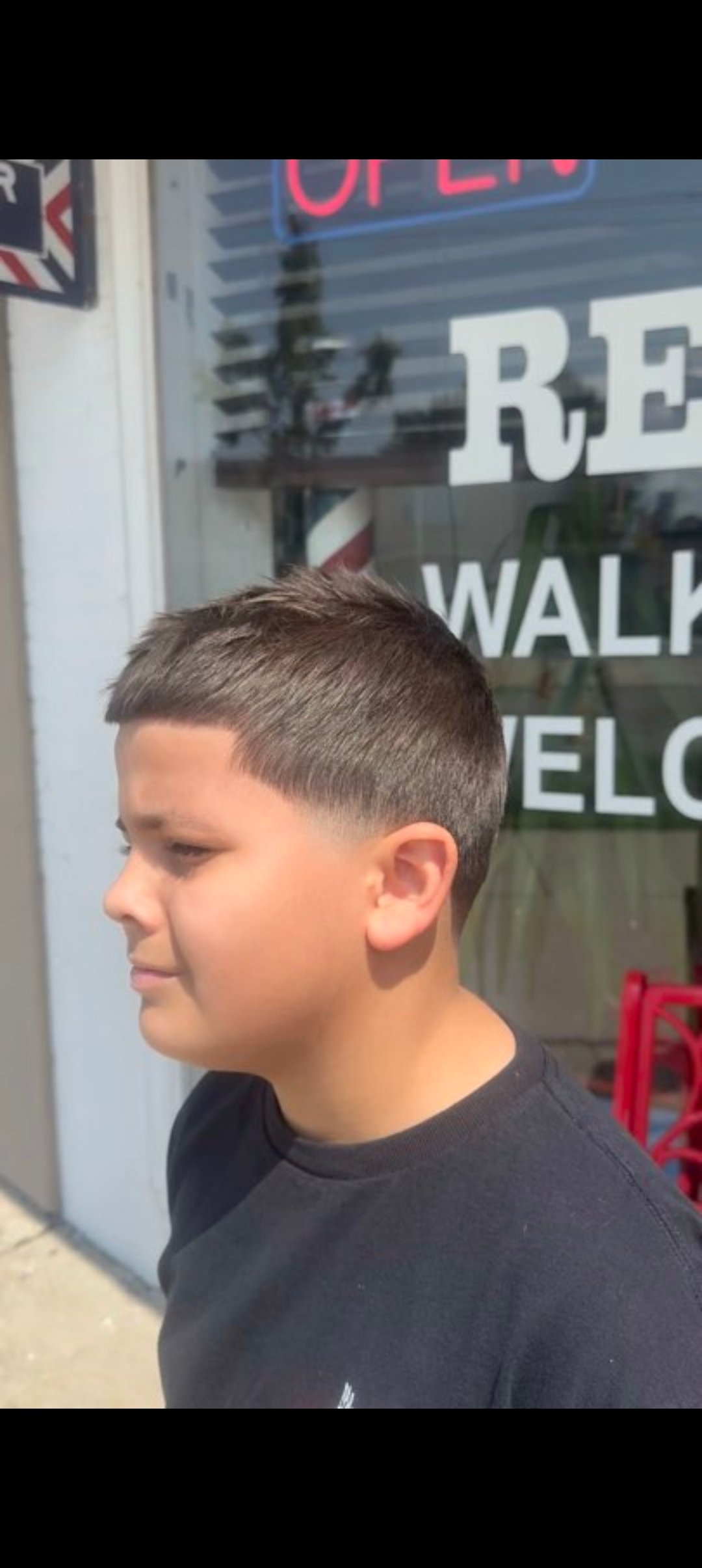 A classic cut in progress at Sammi Red's Real Barbers barbershop