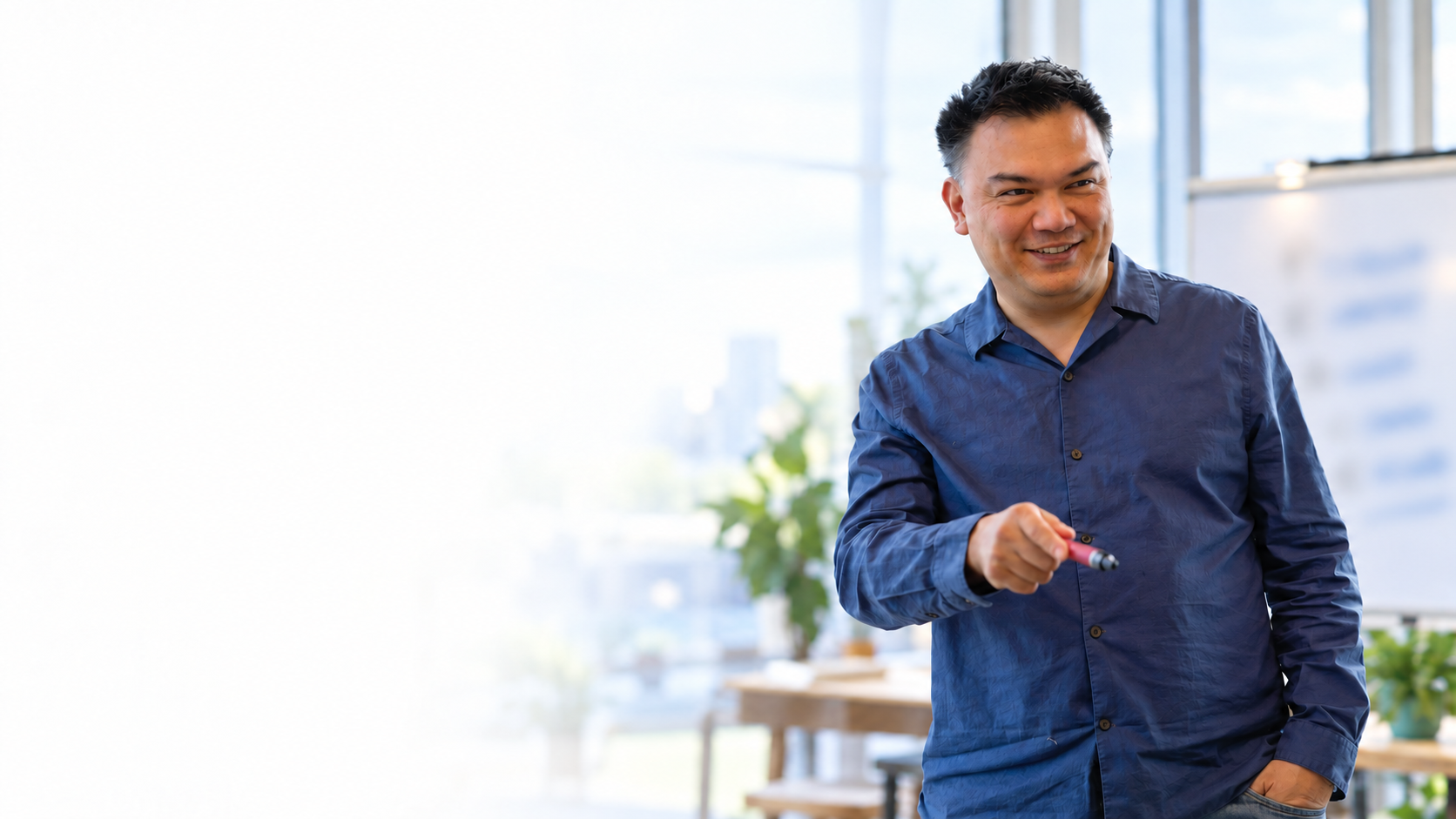 AI-composited concept portrait of Alex Changho in a bright teaching studio
