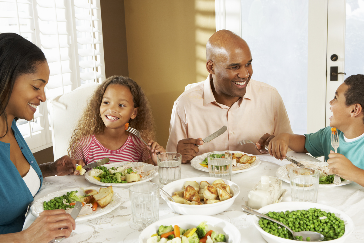 Family eating dinner at home. 