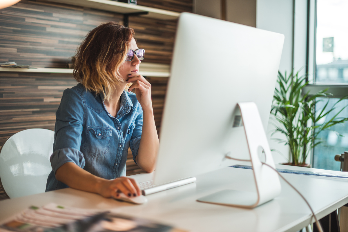 Women searching for hotel deals on her computer