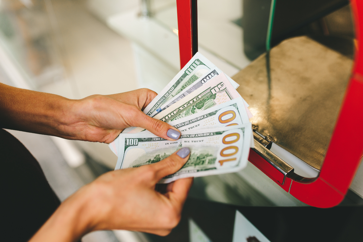 Women fanning out money Women fanning out money