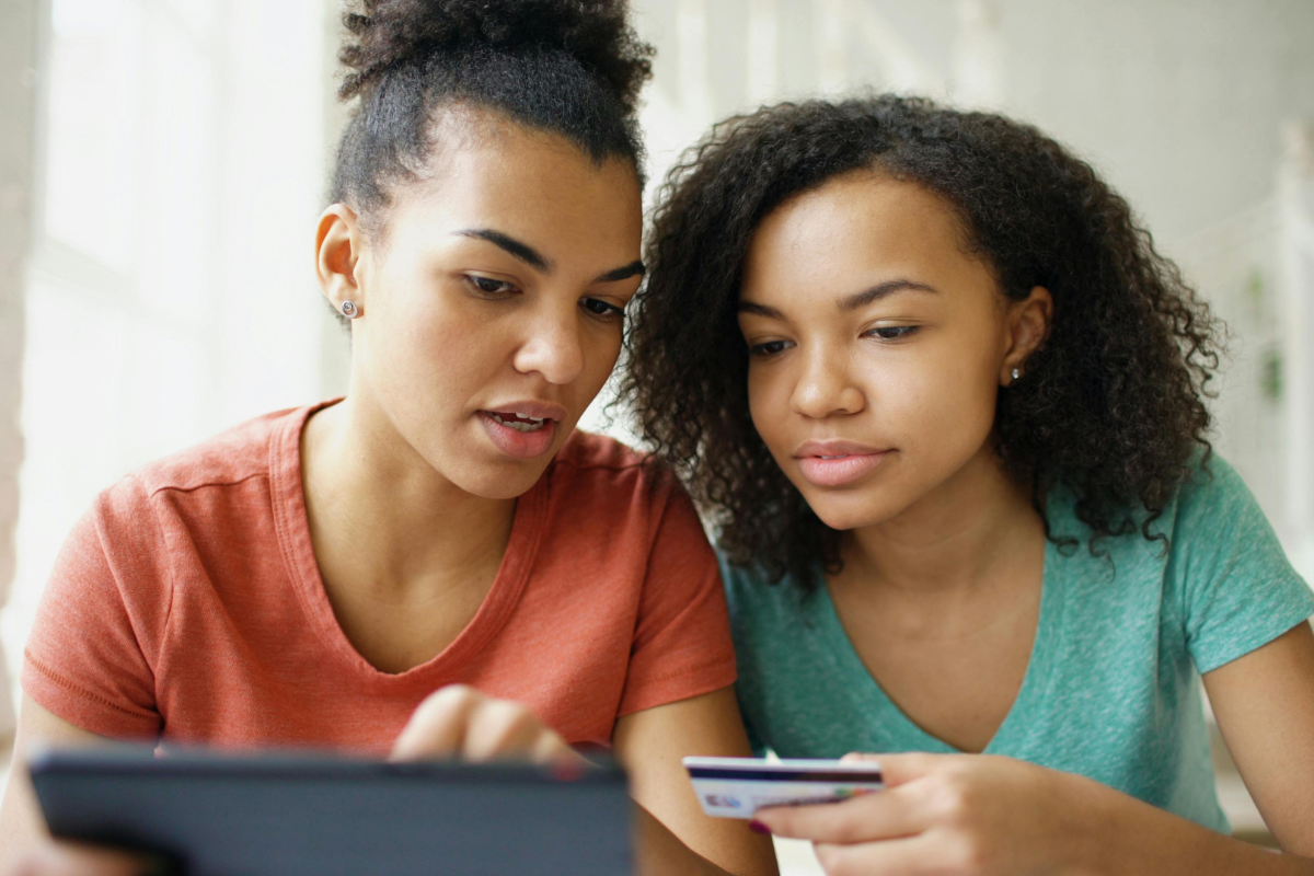 Two women buying online