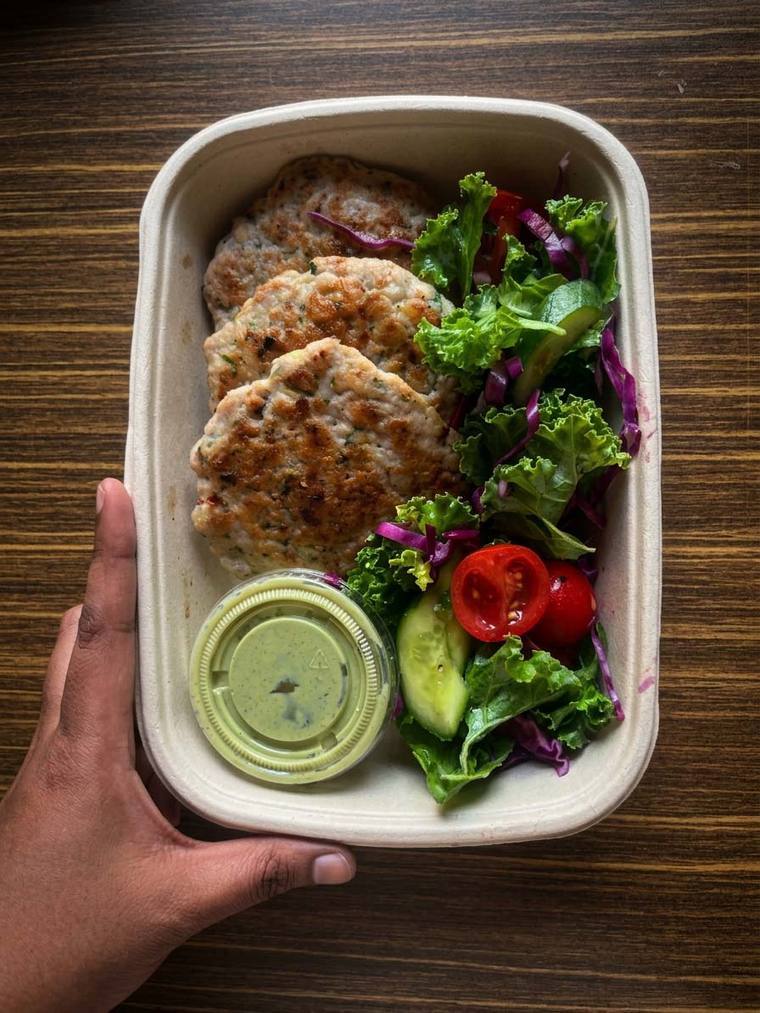 Fresh Hyphen meal box held in hand