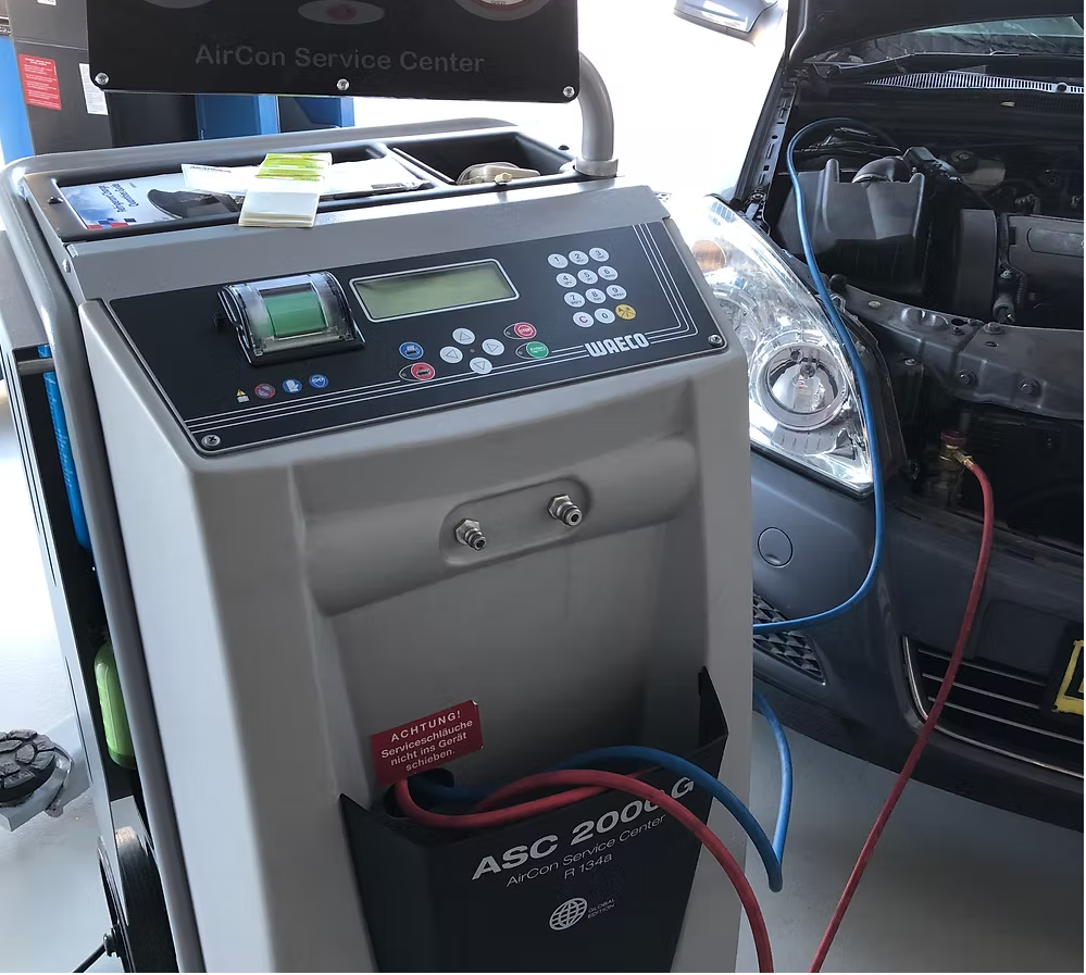 Automotive air conditioning service and regas being performed at 313 Automotive Russell Lea