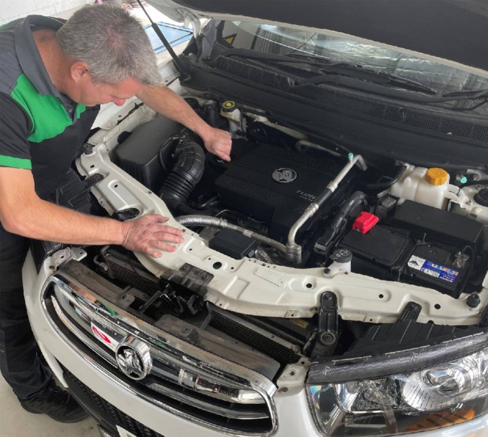 Automotive technician carrying out mechanical repairs and diagnostics at 313 Automotive in Russell Lea