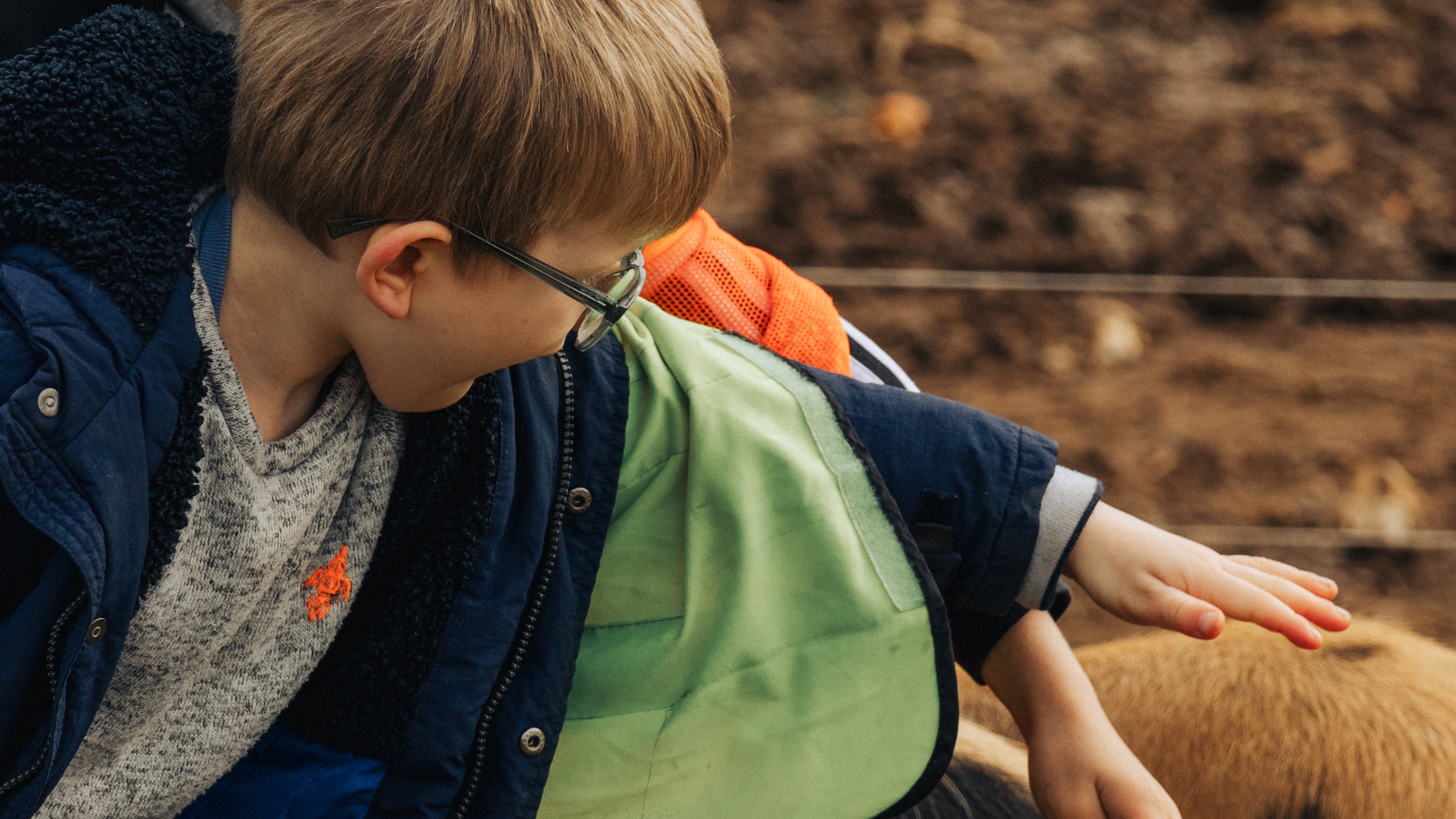 yellow and black 4-wheeled robot vehicle toy