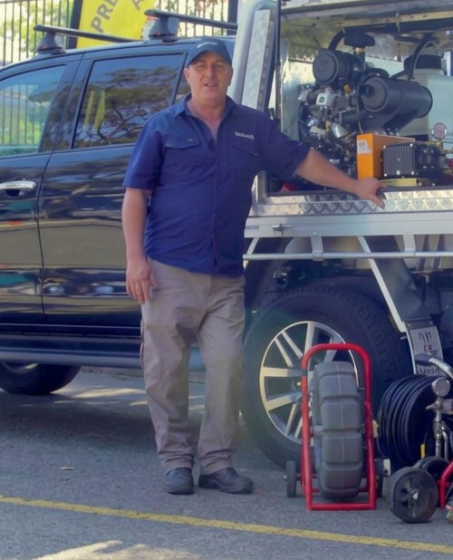Kevin Barry of Streamline Drains & Pipelines with his pipe relining ute and equipment