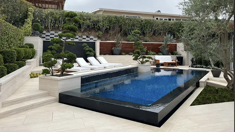 Biophilic landscape and design-build outdoor room by Elevation Living Walls