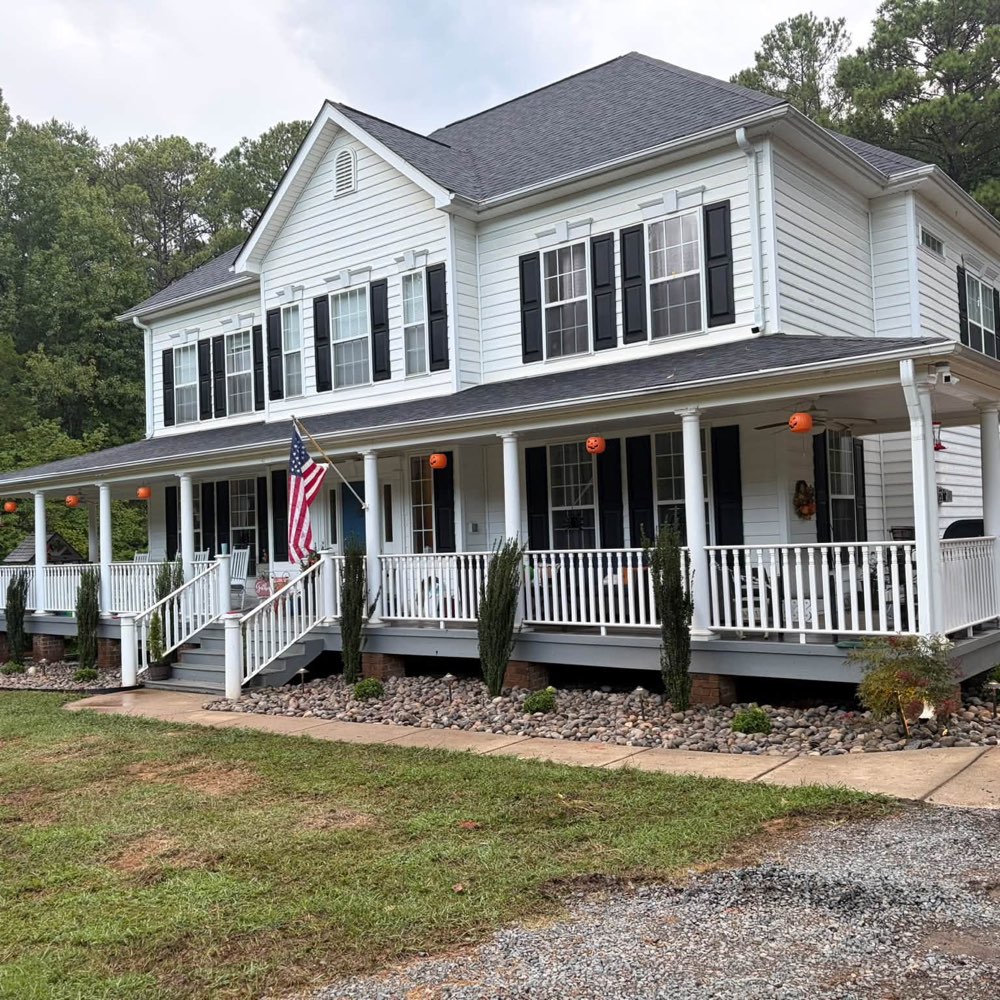 Well-maintained property with fresh landscaping and a wide front lawn maintained by Keller Lawns