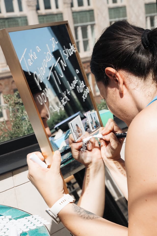 Guest signing the community board