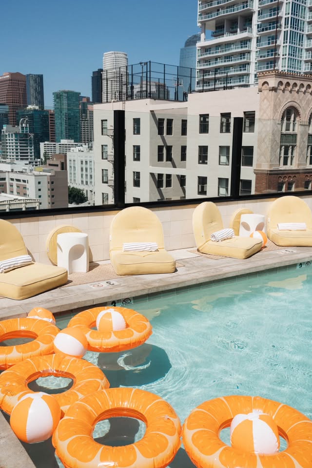 Rooftop pool with colorful floats