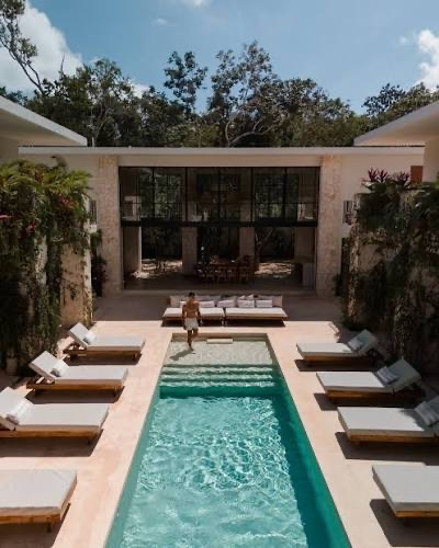 Pool courtyard with sun loungers