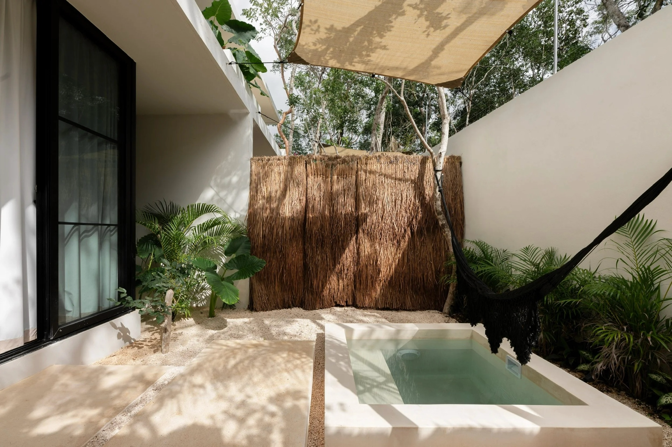 Private courtyard with a hammock