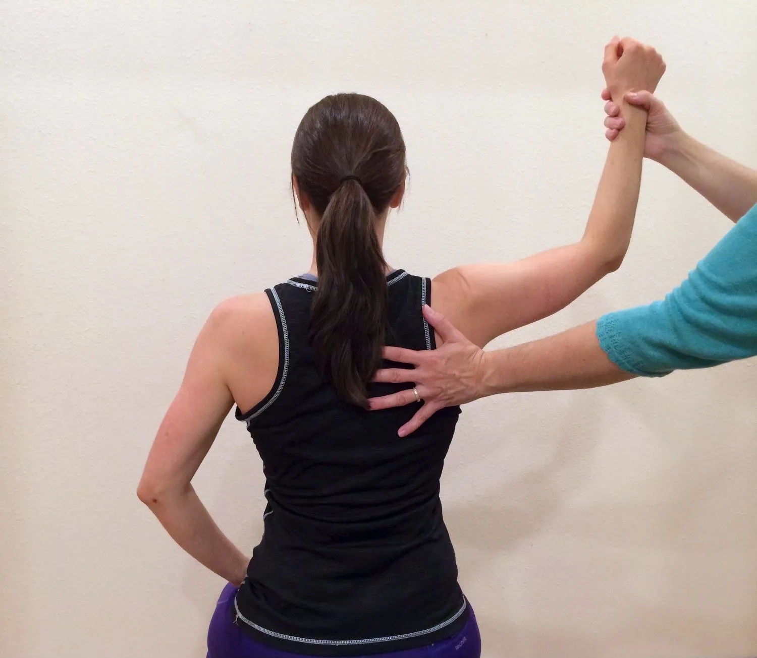 Physical therapist treating patient