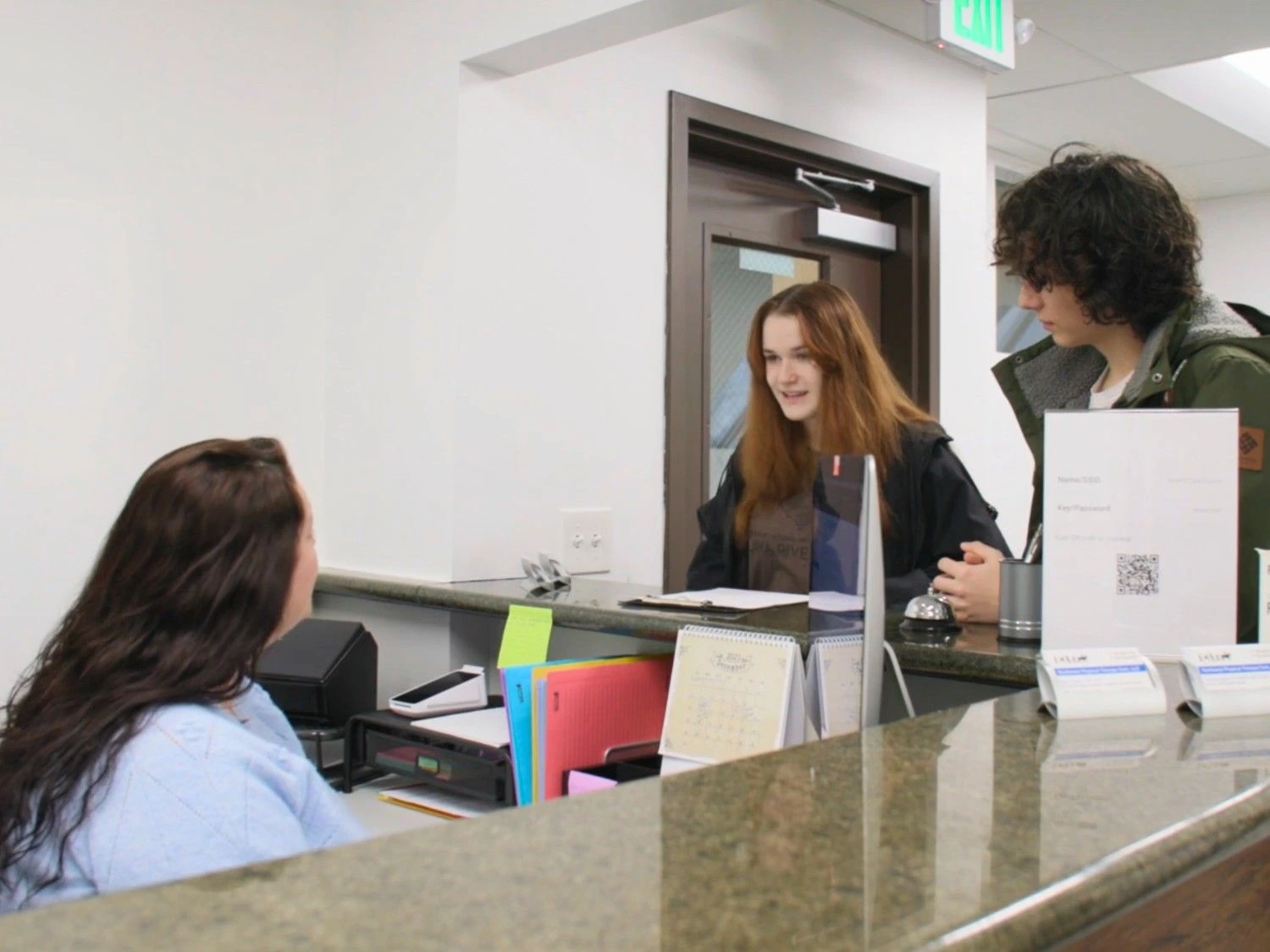 Friendly reception desk and waiting area at Northwest Physical Therapy Care