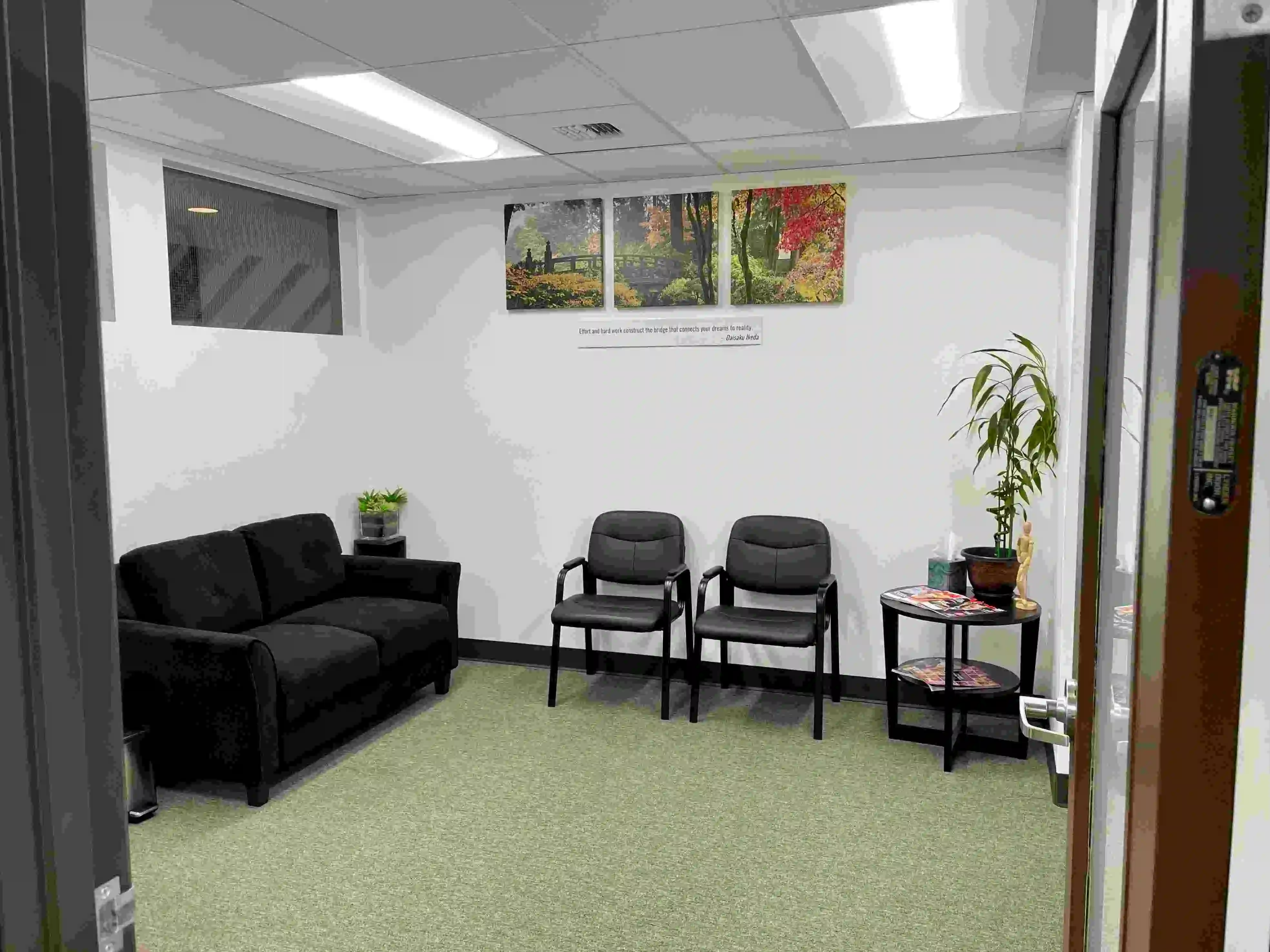 Clinic treatment area with specialized physical therapy equipment