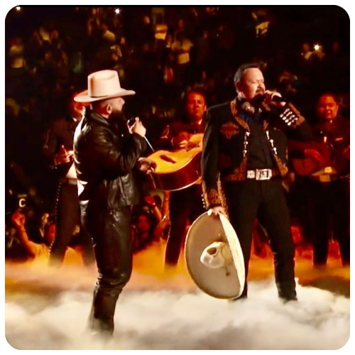 Mariachi Juvenil Grullense with Pepe Aguilar backstage at a music festival in Southern California.