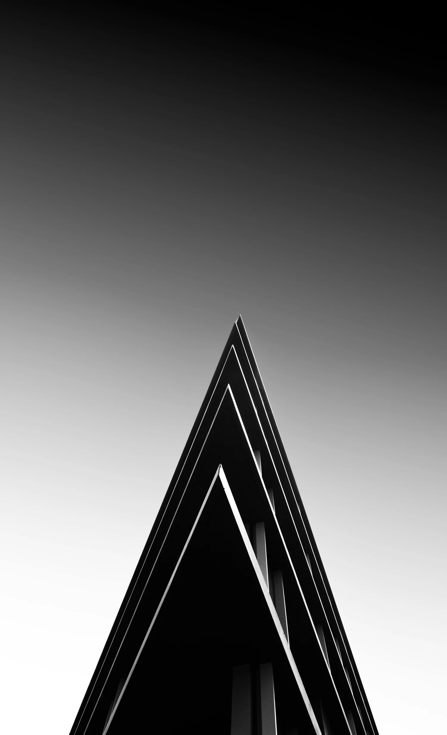 Modern architectural building with sharp triangular peaks